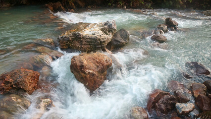 hot water river with beautiful and amazing sulfur rocks