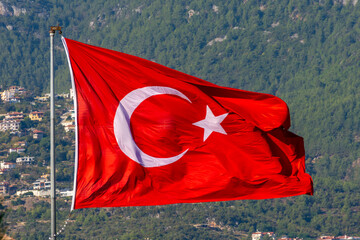 National flag of Turkey waving over Alanya