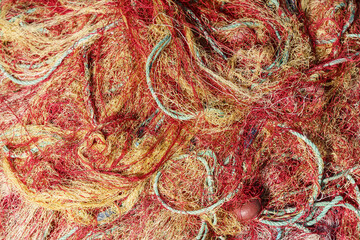 Fishing nets close up abstract background. Nylon fishing nets on a boat.