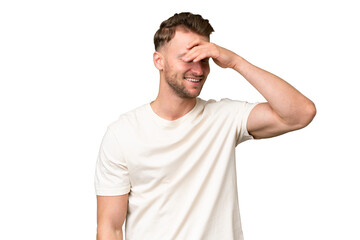 Fototapeta premium Young blonde caucasian man over isolated background smiling a lot