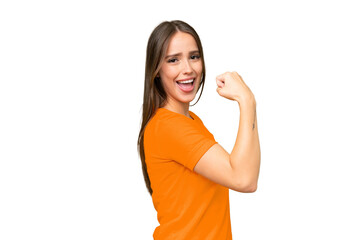 Fototapeta premium Young pretty caucasian woman over isolated background doing strong gesture