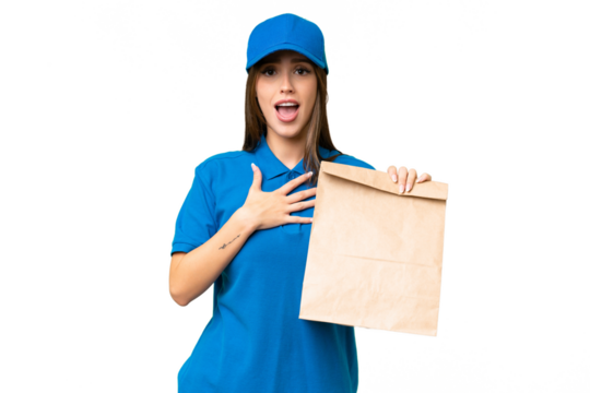 Young beautiful caucasian woman taking a bag of takeaway food over isolated background surprised and shocked while looking right