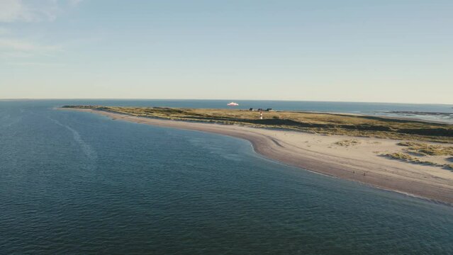 Sylt, Lighthouse Ellenbogen, Northernmost point of Germany. Schleswig-Holstein, North Sea. 4K drone. Beautiful tourist destination and attraction from above.