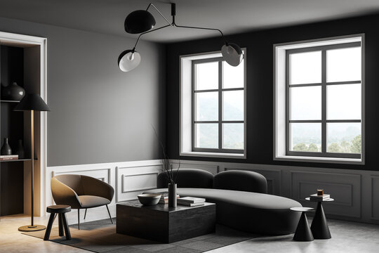 Grey meeting interior with couch and armchair with window. Mockup empty wall