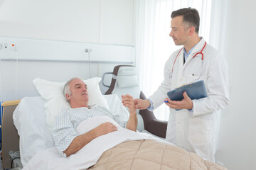 doctor talking with her old patient