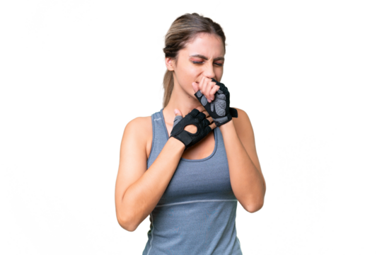 pretty Sport Uruguayan woman over isolated background is suffering with cough and feeling bad