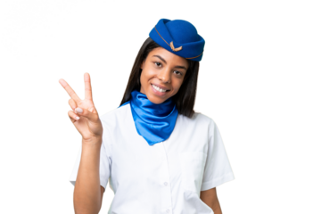 Airplane stewardess African american woman over isolated background smiling and showing victory sign