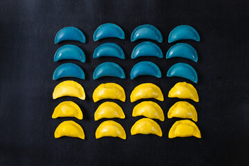 Yellow-blue dumplings made by hand with love. Flag of Ukraine.