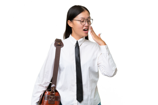 Young Asian business woman over isolated background yawning and covering wide open mouth with hand - Powered by Adobe