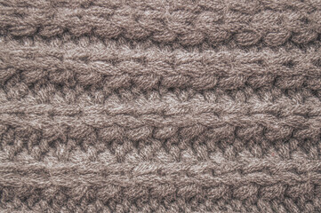 Organic knit material with macro woven threads.