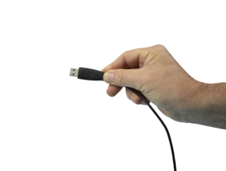 a male hand with a USB plug in his hand