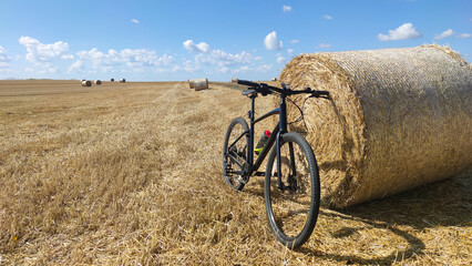 Gravel bicycle ride on the road in the summer season