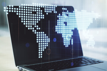 Multi exposure of abstract creative digital world map on laptop background, research and analytics...