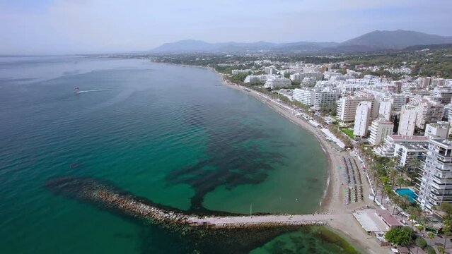 The drone aerial footage of the beach and downtown district of Marbella, Andalucia, Spain.Marbella is a city and municipality in southern Spain, belonging to the province of M&aacute;laga.