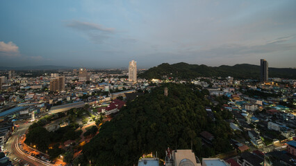 Night cityscape from Si Racha, Chon Buri, Thailand. - obrazy, fototapety, plakaty