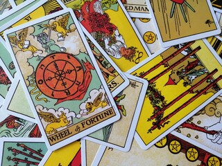 Picture of The Wheel of Fortune tarot card from the original Ride Waite tarot deck with mixed tarot...