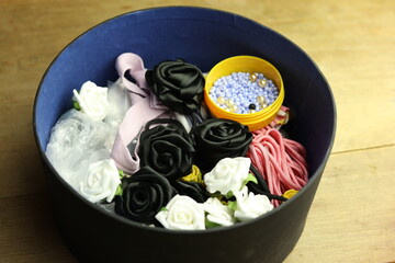 fabric flowers , beads and sewing