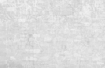 White grunge brick wall texture background for stone tile block seamless pattern in grey light color wallpaper.