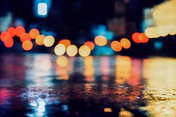 Night city lights, rain, bokeh, flares, reflections. 3d