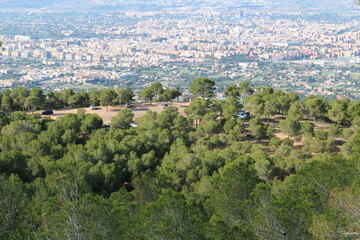 Fototapeta na wymiar Day city view from mountain top.