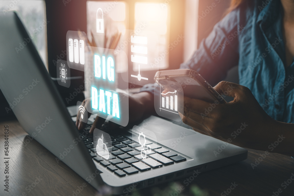 Poster big data concept, person using laptop and smartphone with big data icon on vr screen on office desk.