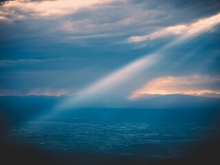 Sun rays through the clouds over the Black Forest in Germany.