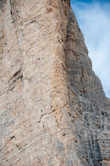 Mountaineers climbing up the 3 Zinnen in the dolomite mountains