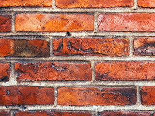 Rustic clay brick pattern as background, texture of an old wall from Halmstad, Sweden