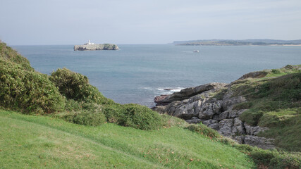 Santander, Spain - 31 Oct, 2022: Faro de la Isla de Mouro from the Magdalena Peninsula, Santander,...