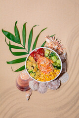 Hawaiian traditional food poke bowl on sand