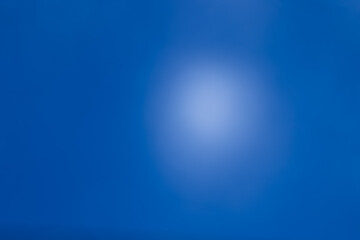 Blue defocused abstract smooth asymmetric gradient background