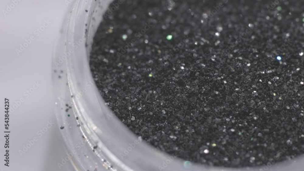 Poster decorative sequins in a jar rotate in a circle