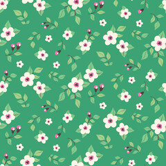 Seamless floral pattern, cute ditsy print with spring botany, small white flowers on a green background. Pretty flower design with mini hand drawn flowers, leaves in liberty arrangement. Vector.