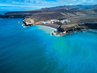 Obraz premium Aerial view of the Atlantic Ocean and the coastline in Ajuy Fuerteventura island drone photography