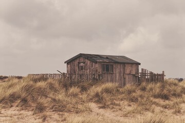 Old wooden house on a hill on a cloudy day in North Berwick, Scotland