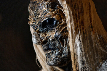 Close-up of witch face on a dark halloween horror night background