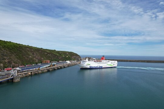 Senna Line car ferry comming into port Fishguard ferry port Wales drone aerial view .