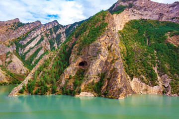Fototapeta na wymiar Picturesque turquoise lake in the Caucasus mountains.