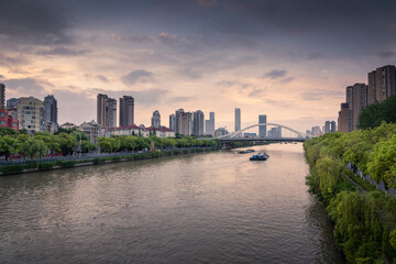 A grand canal runs through the modern city