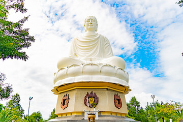 A white Buddha on a lotus flower.  Lang Son Pagoda (Chùa Long Sơn) is the main Buddhist temple of...