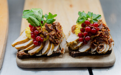 A sandwich. Big sandwich with meat.