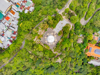 A white Buddha on a lotus flower.  Lang Son Pagoda (Chùa Long Sơn) is the main Buddhist temple of...
