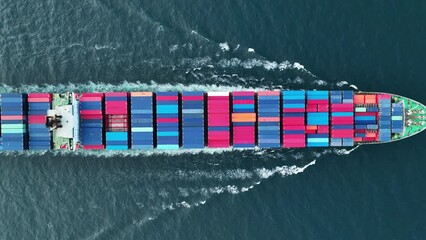 Cargo container Ship, cargo maritime ship with contrail in the ocean ship carrying container and running for export  concept technology freight shipping sea freight by Express Ship. top view 