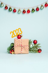 New year gift box. Craft paper and red ribbon