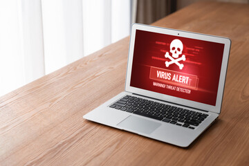 Virus warning alert on computer screen detected modish cyber threat , hacker, computer virus and...