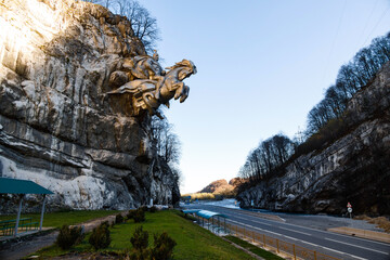 Tseyskoye Gorge, Russia, North Ossetia, October 21, 2021. Sculpture of St. George in the rock at...