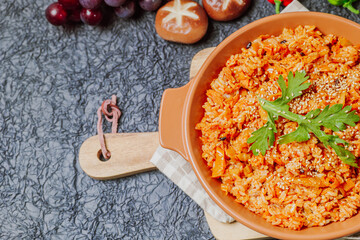 Kimchibokkeumbap, Korean Kimchi Fried Rice : Rice fried with finely chopped kimchi. Beef, pork, onions, green onions, and other vegetables may be added according to taste.