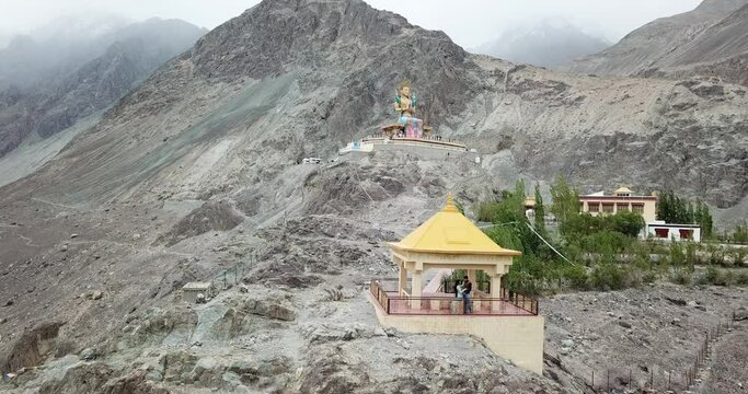 Lord Buddha statue against blue sky, Diskit Monastery in Nubra Valley, Leh, Ladakh