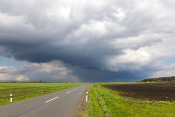 Fototapeta na wymiar empty road with dramatic sky