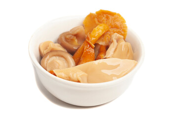 Bowl of marinated mushrooms isolated on white background